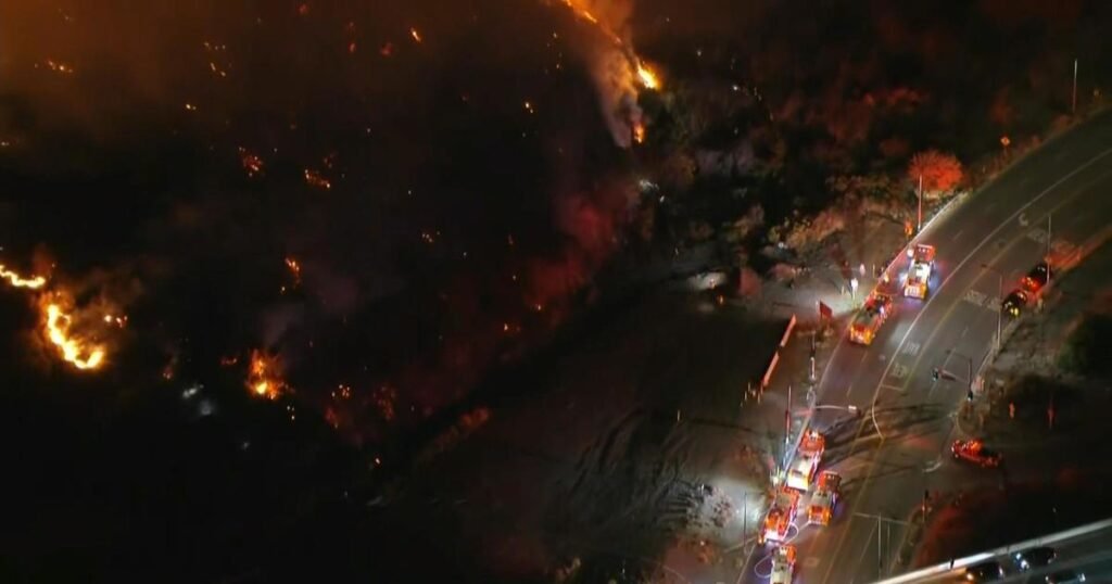 New-wildfires-driven-by-high-winds-force-evacuations-in-LA.jpg