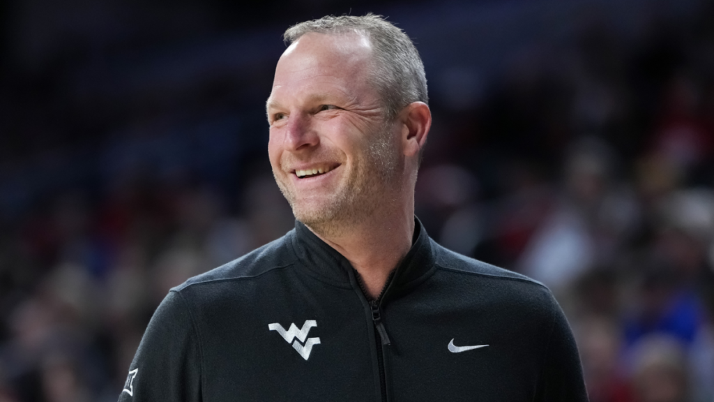 College-basketball-coaching-changes-Darian-DeVries-leaves-West-Virginia-for.png