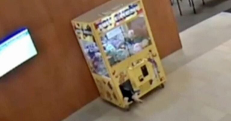 Child-rescued-after-getting-stuck-in-claw-machine.jpg