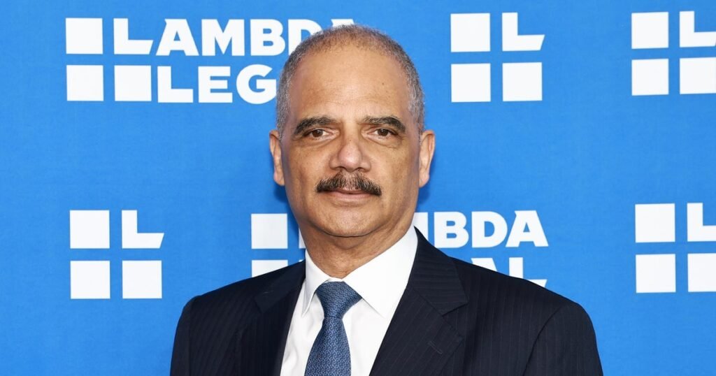 Former-Attorney-General-Eric-Holder-talks-with-House-Democrats-about.jpg