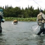 Grizzly-bear-charges-toward-Seattle-Kraken-teams-mascot-during-video.jpg