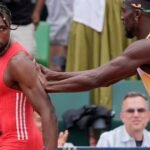 Noah-Lyles-shoved-by-Kenny-Bednarek-after-winning-200-meters.jpg