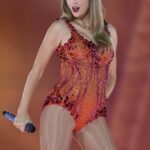 Taylor-Swifts-love-of-the-color-orange-sets-social-media.jpg